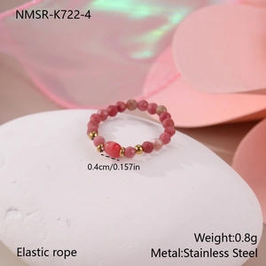 Detailed view of pink natural stone bead ring with 0.4cm bead size and elastic rope band