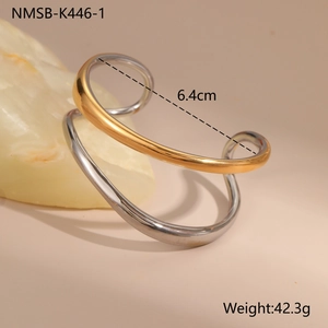 Two-tone wavy stainless steel open bangle with hammered texture, 6.4cm diameter