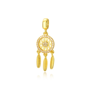 Macro detail of 18K gold-plated dreamcatcher charm with micro-pave crystals and feather pendants