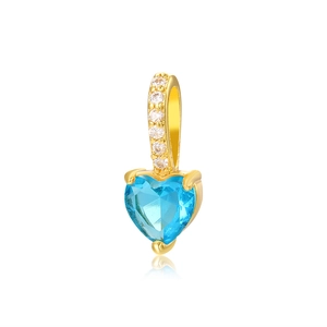 Detail of 18k gold heart pendant with faceted blue zircon and pavé crystal bail