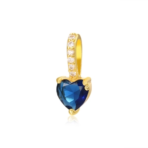 Detail of 18k gold plated heart pendant featuring a deep blue zircon and pave white diamonds