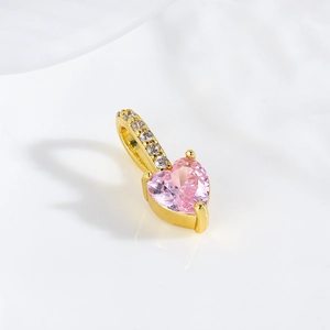 18k gold plated heart pendant with pink zircon stone and diamond accents on white background
