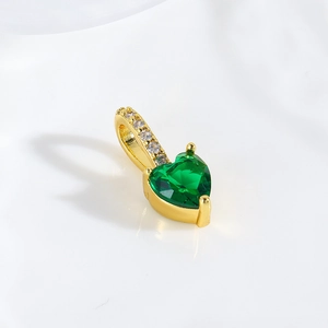 18k gold plated heart pendant with green zircon and pavé crystals on white background
