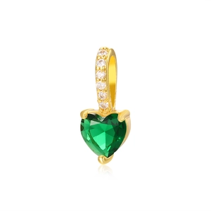 Macro shot of heart-shaped emerald green zircon pendant with 18k gold-plated base and bail