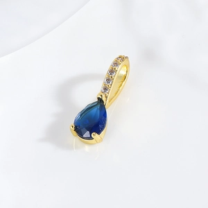 Deep blue teardrop zircon pendant with 18k gold plating and white micro-pave stones
