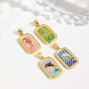 Elegant gold-plated tarot necklaces featuring colorful seahorse and dolphin enamel pendants
