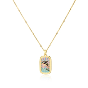 Detail of elegant gold-plated ocean dolphin pendant with colorful enamel tarot card design
