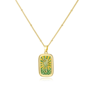Elegant gold chain necklace with a vintage green seahorse tarot style enamel pendant