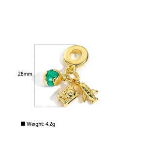 Detailed close-up of 28mm travel charms with airplane, suitcase and globe for jewelry
