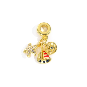 Golden ocean travel charm featuring a sparkling starfish, sailboat, and blue rudder