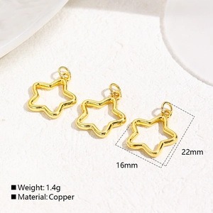 Macro view of 18k gold plated brass star pendants with 22mm by 16mm dimensions