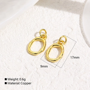 Macro shot of 9mm x 17mm gold copper irregular oval pendants for DIY jewelry design