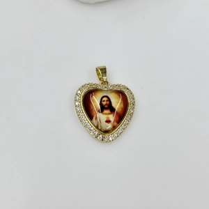 Detailed heart-shaped religious pendant featuring sacred heart image and white zircons