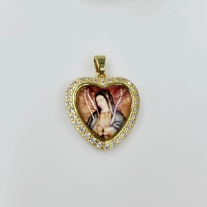 Detailed view of heart-shaped gold pendant with Virgin Mary icon and zircon border