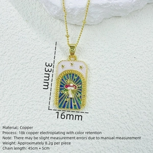 Close-up of tarot style mushroom pendant showing 33mm by 16mm dimensions and gold chain