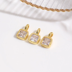 Macro shot of 18k gold plated square cubic zirconia charms for DIY jewelry making