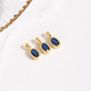 Three oval blue zircon charms with gold metal edges for DIY necklace jewelry making