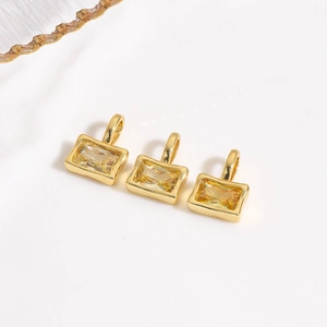 Three gold plated rectangular pendants with yellow cubic zirconia for DIY jewelry making