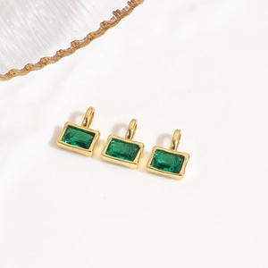 Three dainty gold rectangular pendants with emerald green cubic zirconia for DIY jewelry
