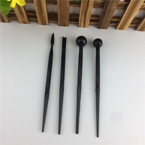 4-piece black fondant modeling tools set with various tips for cake decorating