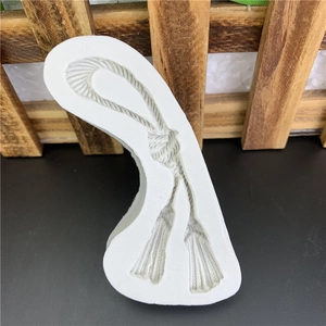 White silicone mold for DIY tassel and rope patterns for fondant baking and soap crafting