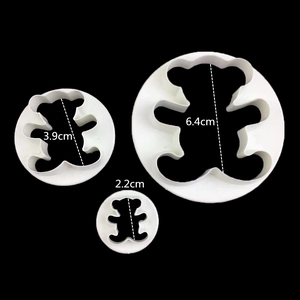 3-piece set of white plastic bear-shaped cookie cutters in large, medium, and small sizes