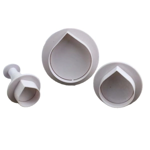 3-piece set of white leaf and teardrop shaped cookie cutters with spring-loaded press handle