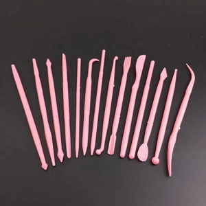 Detailed 14-piece pink clay modeling tool set for DIY cake decorating and sculpting