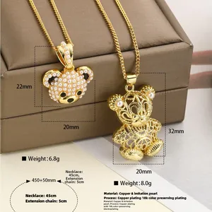 Collar con colgante de oso chapado en oro con perlas de imitación y diseño calado
