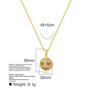 Detail view of 18k gold plated emoji pendant with zircon stones and dimension labels