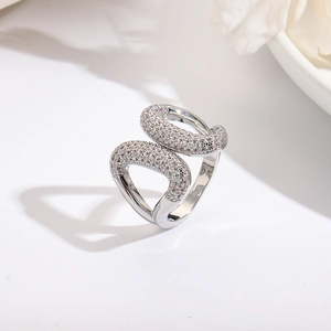 Close-up of dual-layered silver-finish ring with sparkling micro-pave crystals