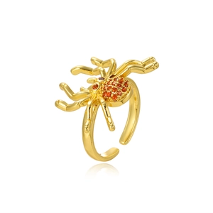 Anello ragno regolabile placcato oro 18k con strass arancioni e rossi su sfondo bianco