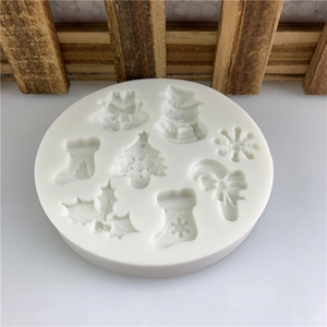 Christmas silicone mold with tree, snowflake, and sock patterns for DIY cake decoration
