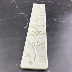 White silicone jasmine leaf and vine mold for fondant cakes and craft decorations