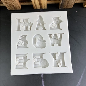 Halloween silicone mold for chocolate featuring 9 letters with wizard hats and pumpkins