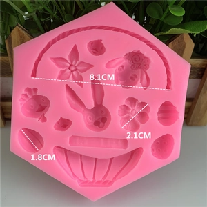 Pink silicone Easter mold with rabbit, chick, and egg patterns for fondant and DIY crafts
