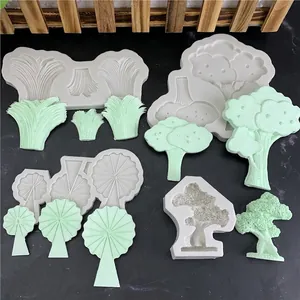 Silicone mold set featuring four distinct tree and plant designs for DIY cake decoration