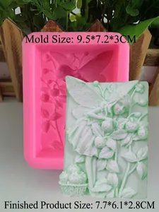 Pink silicone mold for angel wing and fairy soaps with embossed garden flower patterns