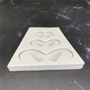 White mustache silicone mold with three different sizes for chocolate and cake decorating