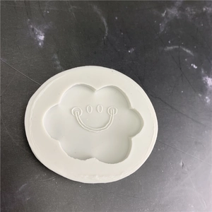 White silicone cloud smiling face mold for chocolate, fondant, and cake decoration tools