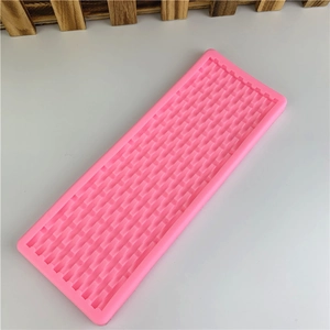 Pink silicone mold featuring intricate woven basket texture for DIY fondant cake decoration