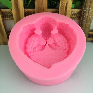 Pink heart-shaped silicone mold featuring flying birds and Always in our thoughts text