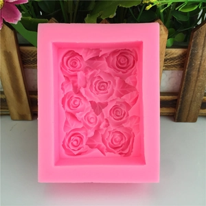 Pink rectangular silicone rose mold for chocolate cake decorating and soap making