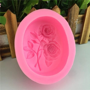 Pink silicone mold with realistic double rose design for cake decorating and DIY soap making