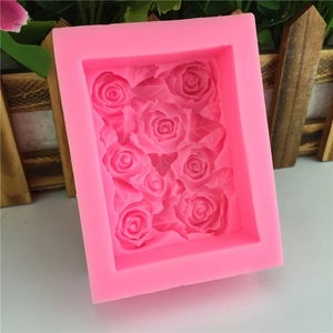 Pink rectangular silicone mold with rose patterns for fondant cake and soap making