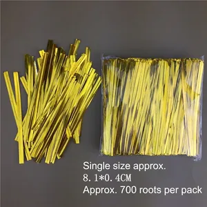 Close-up of 8cm metallic gold twist ties for lollipop and candy bag packaging