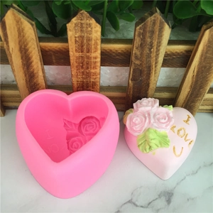 Pink heart-shaped silicone mold with 'I LOVE U' text and rose floral relief pattern