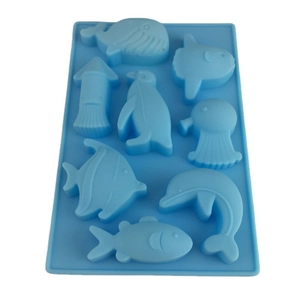 Macro detail of blue food-grade silicone mold with 8 sea animal shapes for baking
