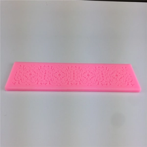 Pink silicone lace fondant mold with diamond flower patterns for cake edge decoration