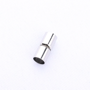 Detailed close-up of polished silver cylindrical magnetic clasps for DIY jewelry making